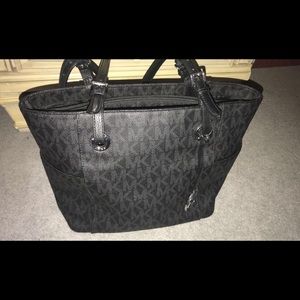 Black and silver Michael Kors bag